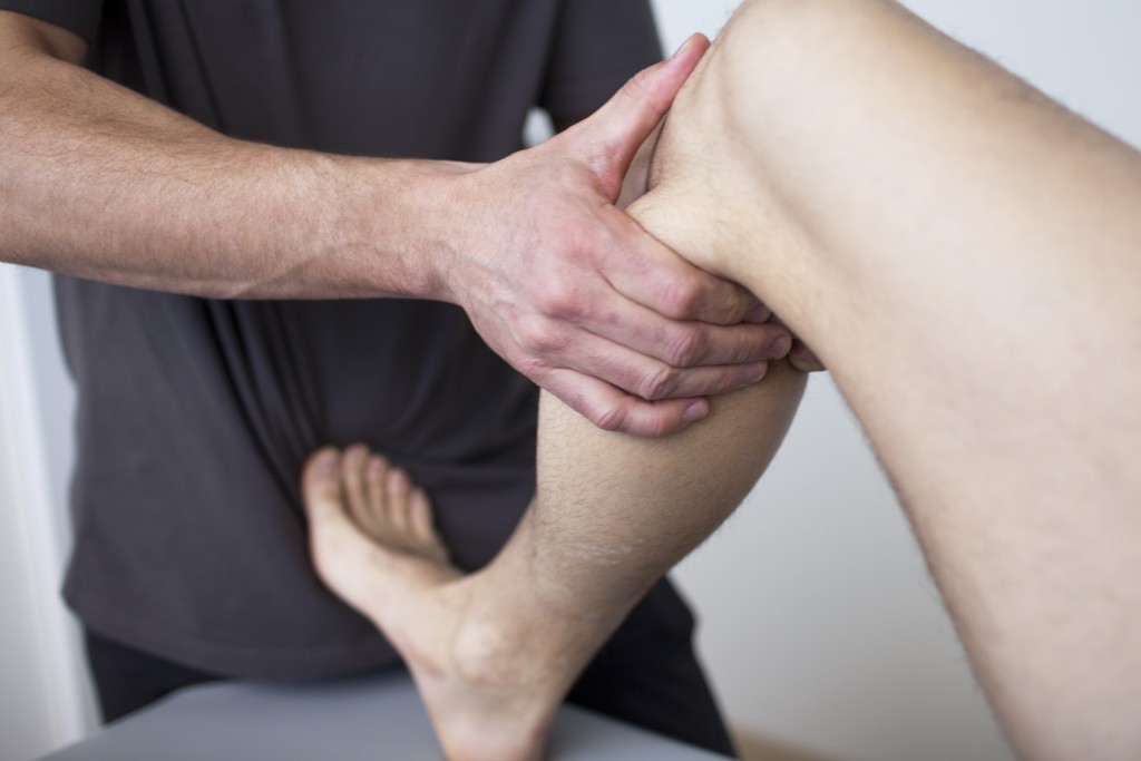 man undergoing physical therapy