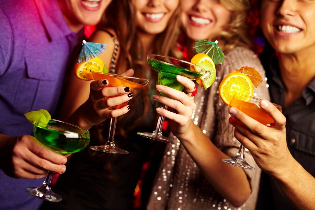 group of friends with cocktails