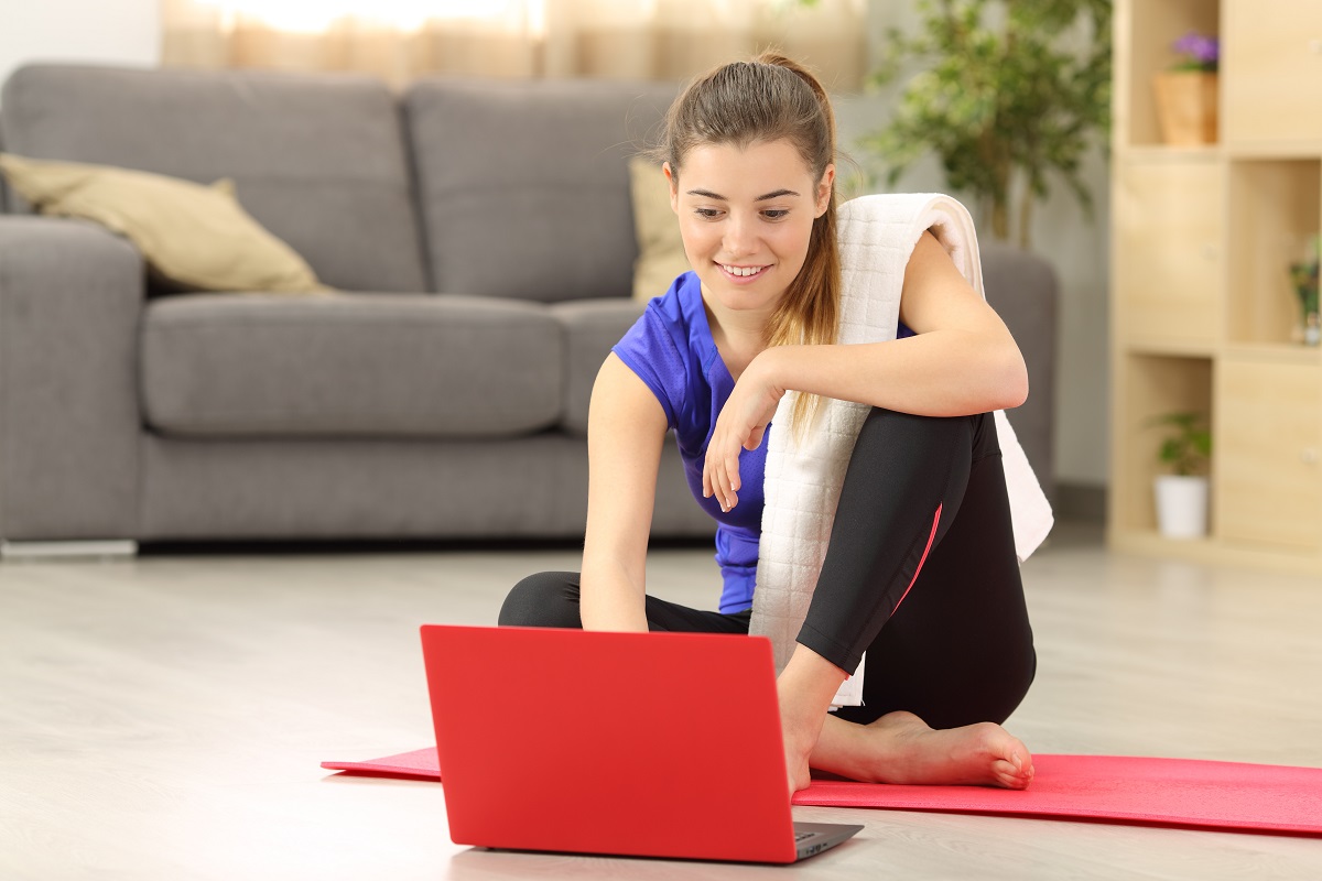 woman exercising at home