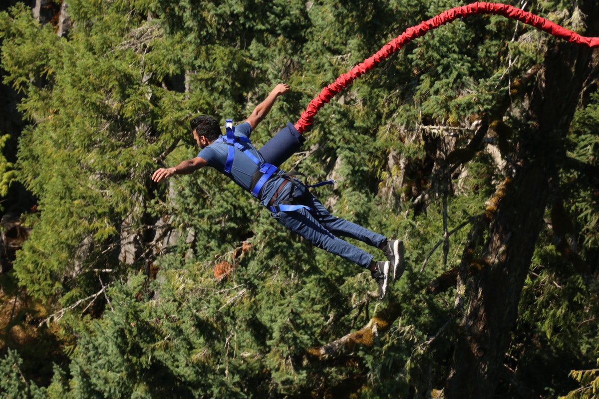 man bungee jumping