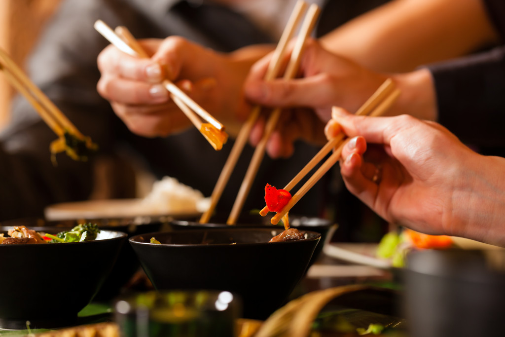 people eating Japanese food