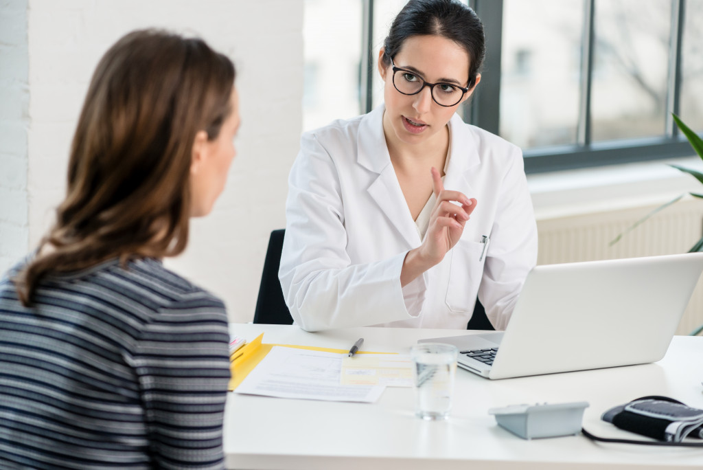 A woman consulting a medical specialist in a clinic