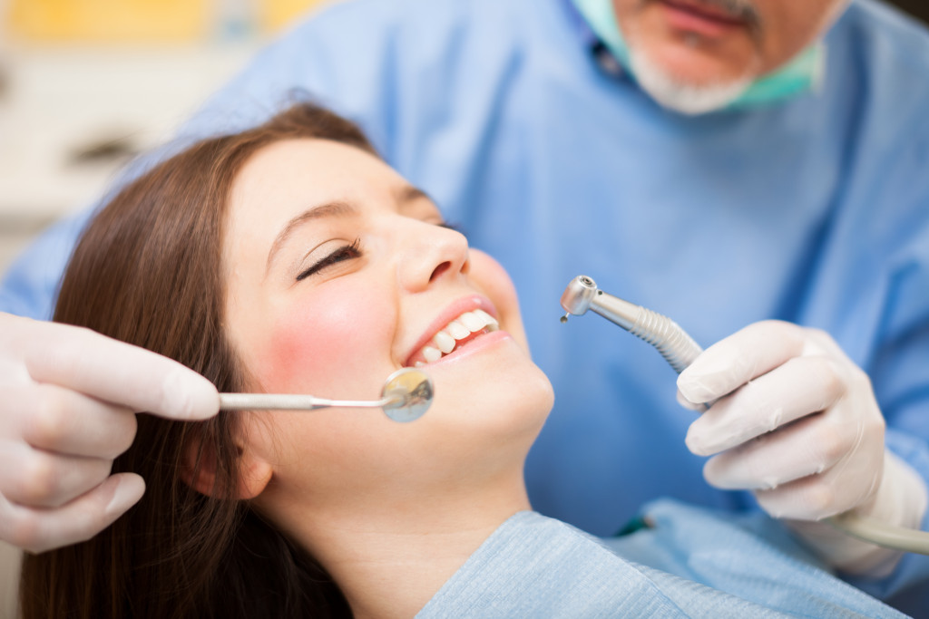 a female patient in a dental treatment