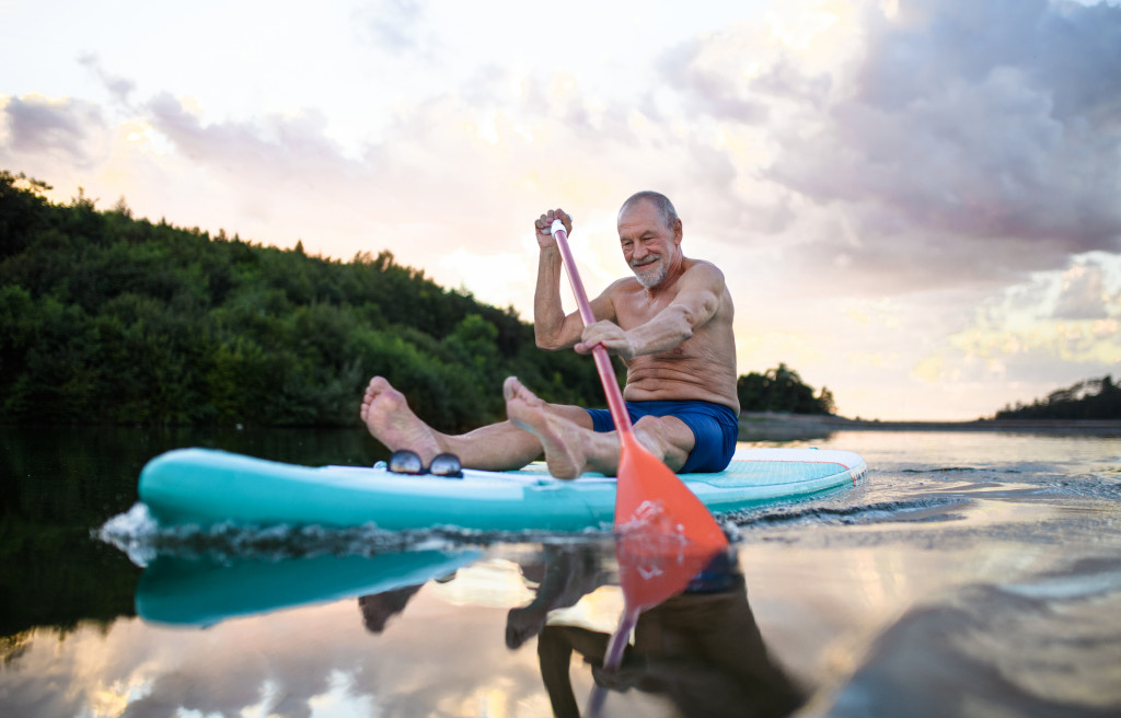 Trying paddleboarding in vacation