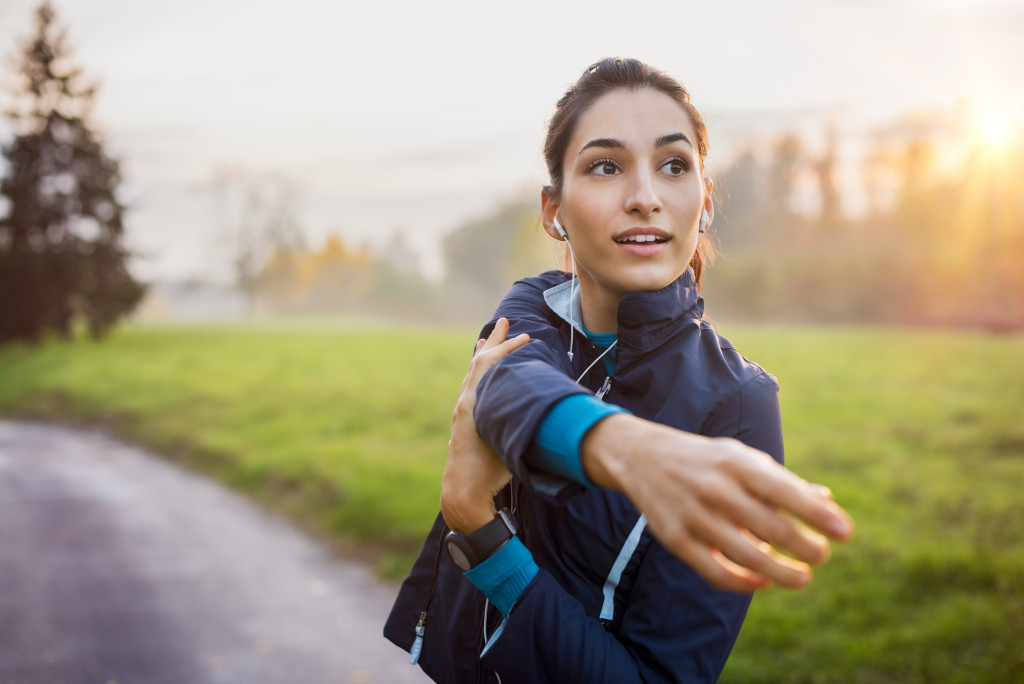 a woman doing stretching exercises